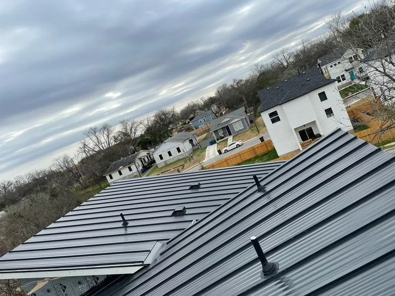 Standing seam metal roof panels with vents for Skylight Repair in Broomfield